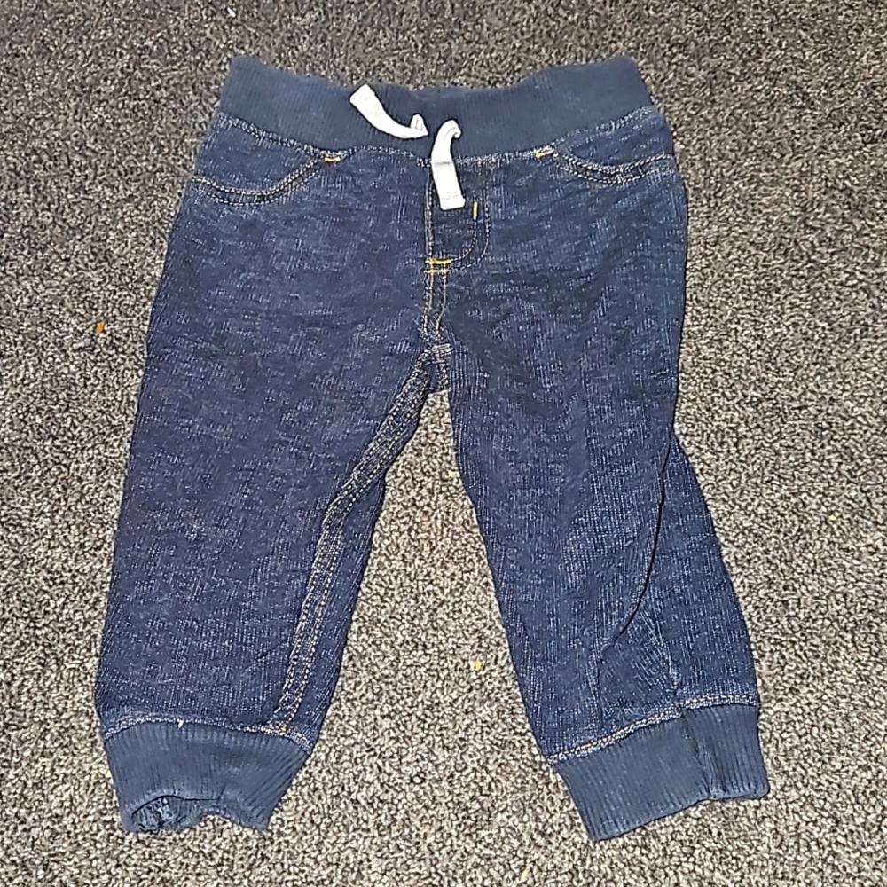 9 month drawstring dark washed jeans.
